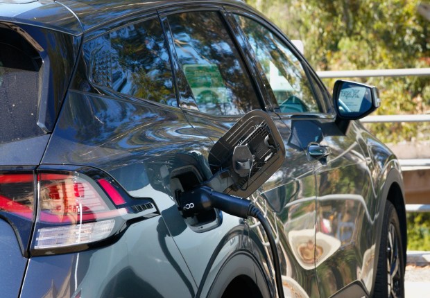 A set of EV chargers is located in the parking lot of the Balboa Park Fleet Science Center in San Diego, CA, on Friday, Oct. 31, 2025. (Nelvin C. Cepeda / The San Diego Union-Tribune)