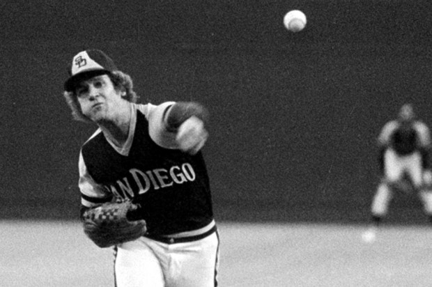 San Diego Padres pitcher Randy Jones, warms up Aug.18, 1976, for a night game at Busch Stadium in St. Louis. Jones has a 19-7 record and is hoping for number 20. (AP Photo/JAC)