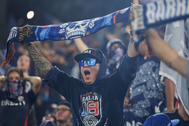 San Diego FC fans celebrate during match three of the Western Conference Round One of the 2025 MLS Cup Playoffs against the Portland Timbers at Snapdragon Stadium on Sunday, Nov. 9, 2025 in San Diego, California. (Meg McLaughlin / The San Diego Union-Tribune)