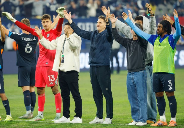 San Diego, CA - November 24: San Diego FC coach Mikey Varas, center, and players celebrates after a 1-0 win against Minnesota United in the Western Conference Semifinals of the 2025 MLS Cup Playoffs at Snapdragon Stadium on November 24, 2025 in San Diego, CA. (K.C. Alfred / The San Diego Union-Tribune)