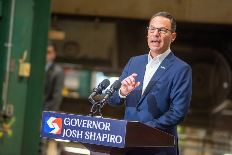 Gov. Josh Shapiro speaks Monday at SEPATA's Frazer Shop and Rail Yard in Malvern. Shapiro announced plans to help SEPTA in its effort to overhaul the Silverliner IV rail cars after a federally mandated inspection of the fleet upended Regional Rail service.