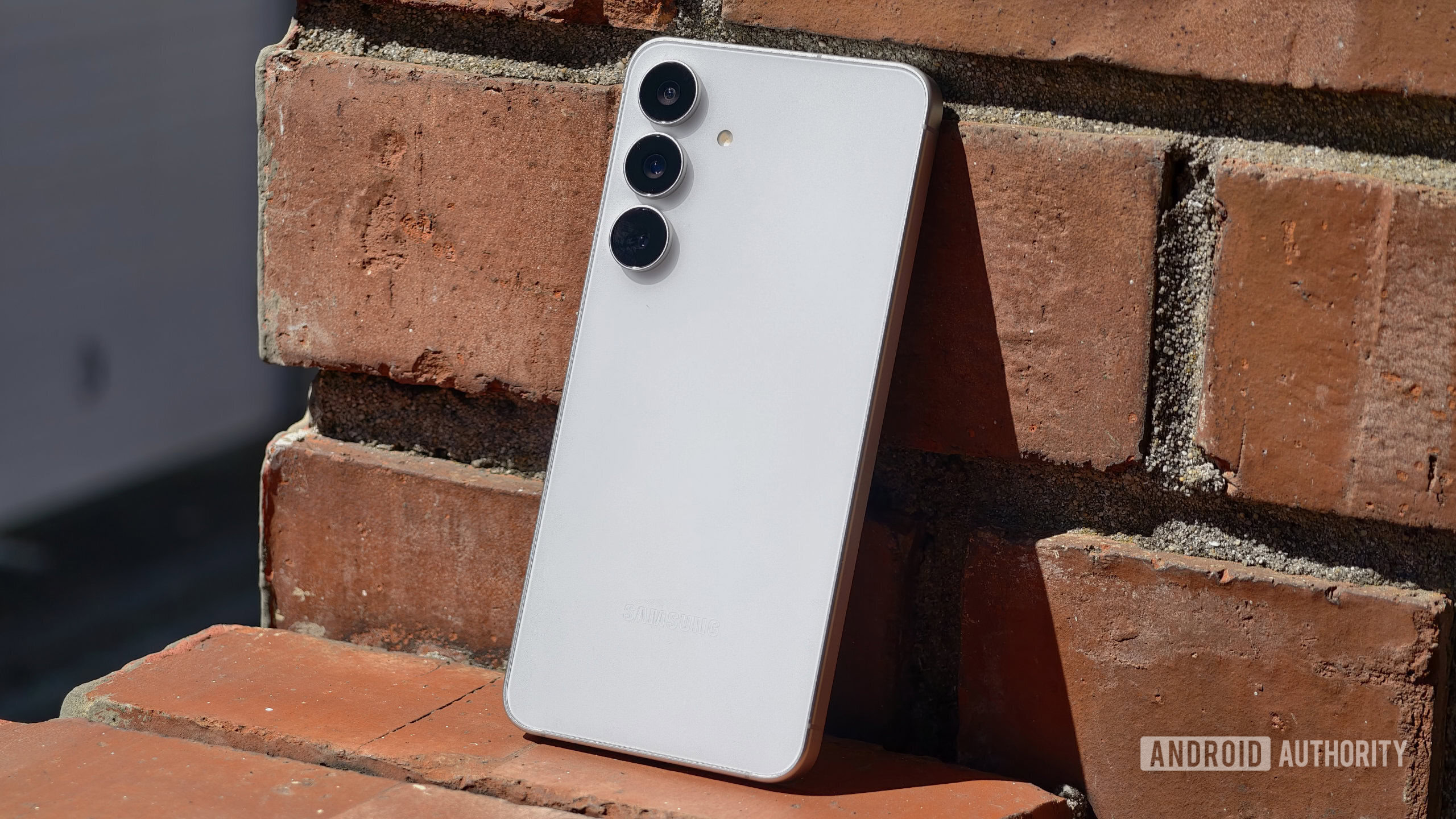 Samsung Galaxy S25 FE against wall showing back