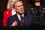 Texas Governor Greg Abbott speaks after signing House Bill 4211, during a press conference...