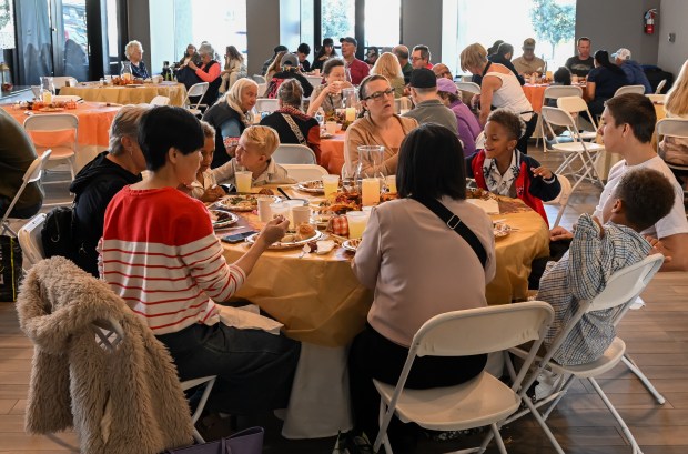 Hundreds of guests arrive to enjoy a free Thanksgiving Day...