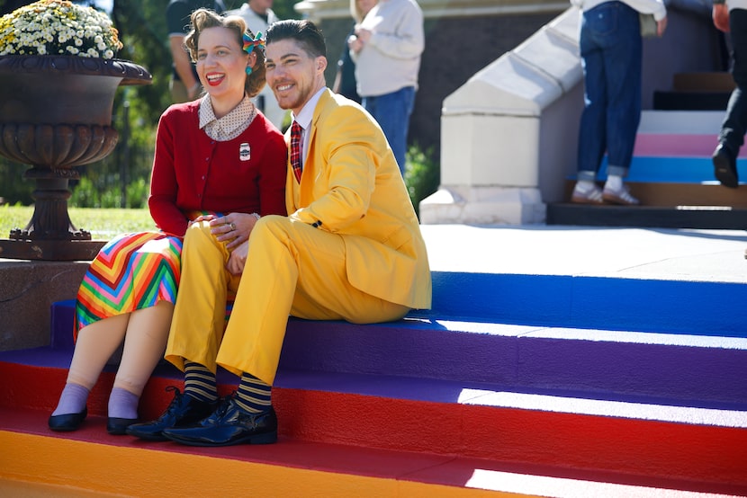 Dallas residents Jessica Hill, 37, (left) and Scottlynd Colgrode, 37, take photos on the...