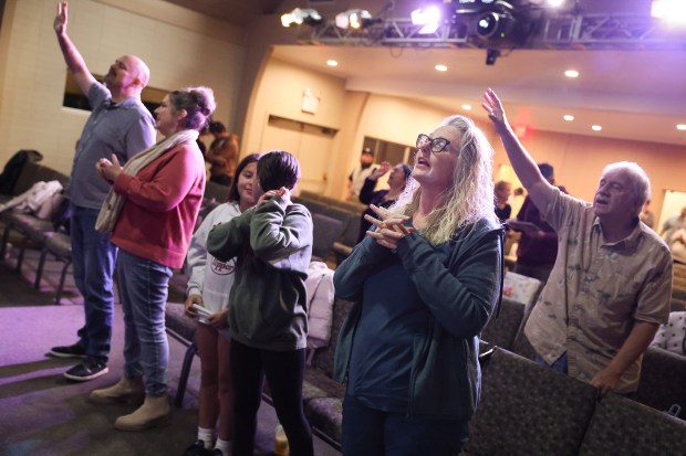 Jesika Quintal sings and prays with the congregation at Lighthouse Christian Church in Sonoma on Wednesday, Oct. 15, 2025. (Christopher Chung/The Press Democrat)