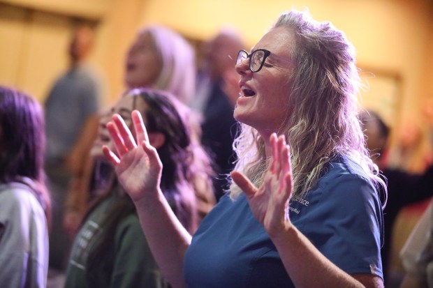 Jesika Quintal sings and prays with the congregation at Lighthouse Christian Church in Sonoma on Wednesday, Oct. 15, 2025. (Christopher Chung/The Press Democrat)