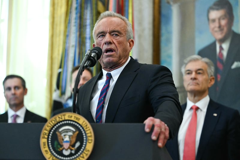 US Secretary of Health and Human Services Robert F. Kennedy Jr. speaks in the Oval Office during an event with President Donald Trump at the White House in Washington, DC on November 6, 2025. Trump announced deals Thursday with pharmaceutical giants Eli Lilly and Novo Nordisk to lower the prices of some popular weight-loss drugs. Both companies "have agreed to offer their most popular GLP-1 weight-loss drug," Trump said, "at drastic discounts." (Photo by ANDREW CABALLERO-REYNOLDS / AFP) (Photo by ANDREW CABALLERO-REYNOLDS/AFP via Getty Images)