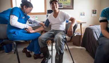 Roberto Tecpile gets his blood pressure checked