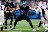 FILE - Detroit Lions center Frank Ragnow looks to block during the second half of an NFL...