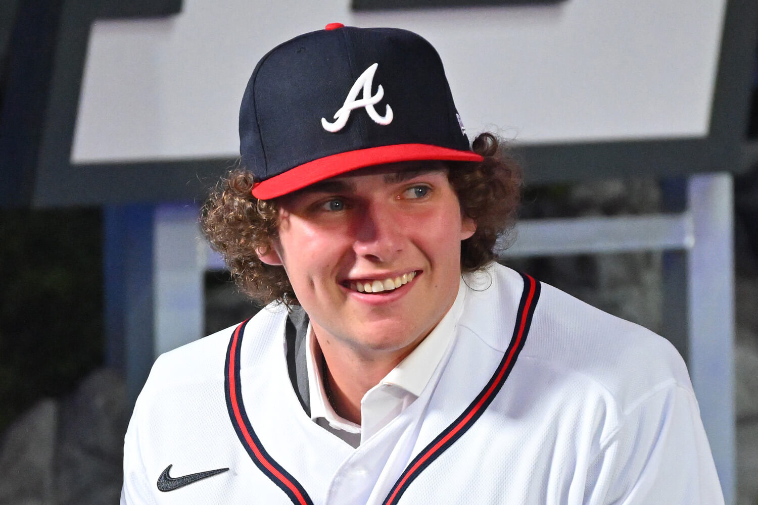 JR Ritchie wears his jersey after he was selected by the Atlanta Braves as the 35th pick of the MLB draft at XBox Plaza at LA Live.