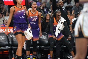 Mercury guard Kahleah Copper (2) and forward Alyssa Thomas (25) cheer on their teammates in the final minutes of their 80-63 win against the New York Liberty at PHX Arena, Aug. 30, 2025, in Phoenix. © Joe Rondone/The Republic / USA TODAY NETWORK via Imagn Images