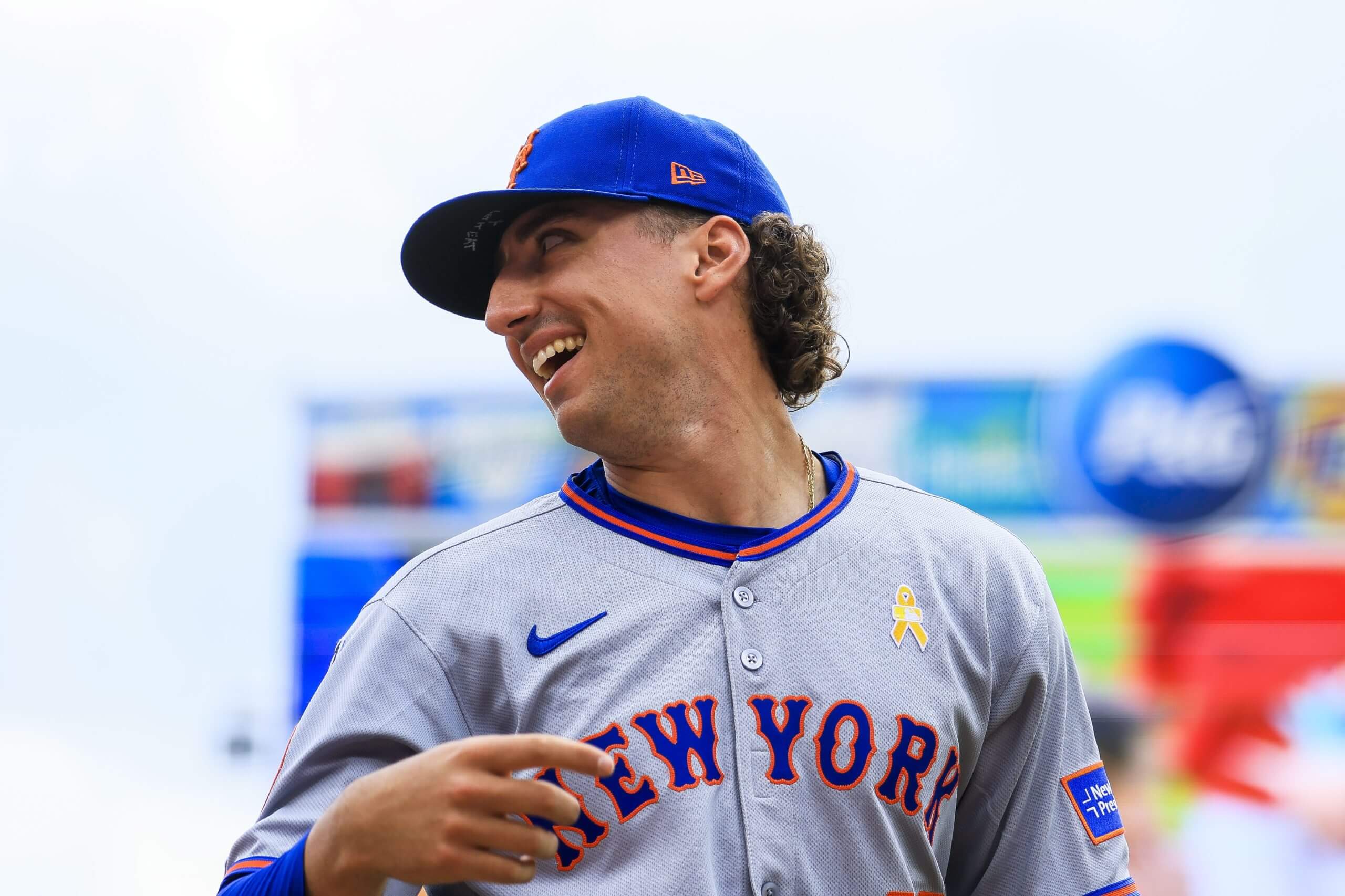 New York Mets starting pitcher Brandon Sproat walks to the dugout before the game against the Cincinnati Reds.