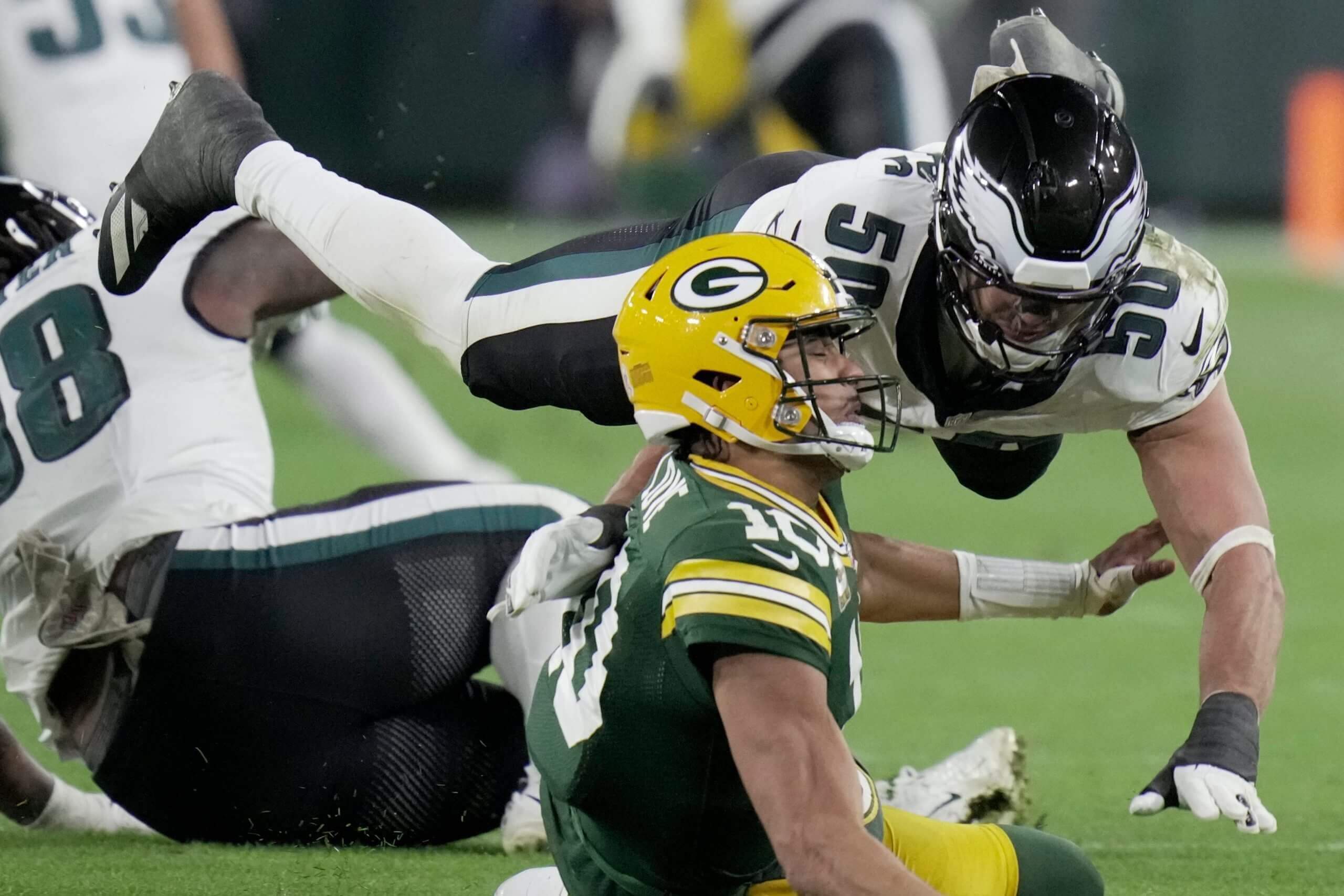 Philadelphia Eagles linebacker Jaelan Phillips pressures Green Bay Packers quarterback Jordan Love.
