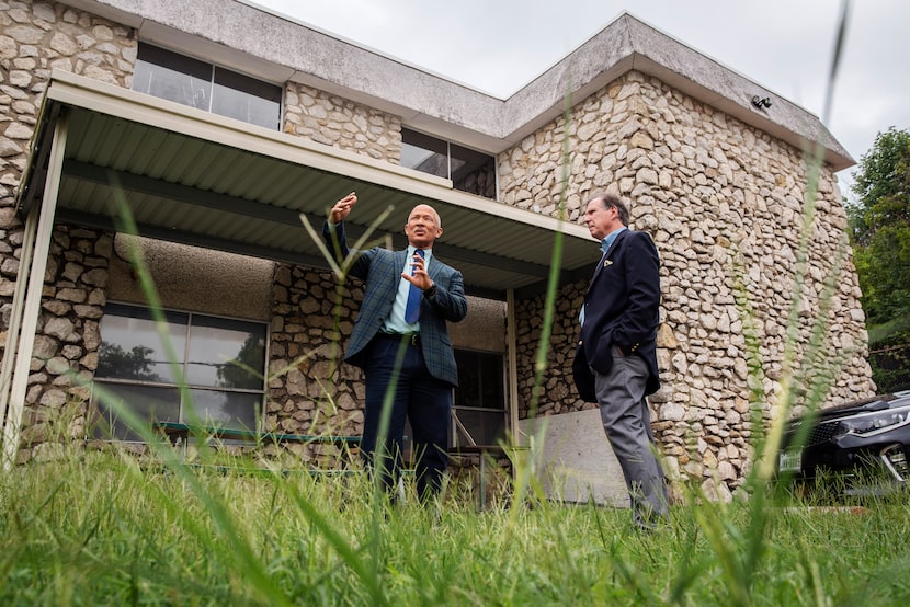 Dallas County District Attorney John Creuzot, left, and Homeward Bound executive director...