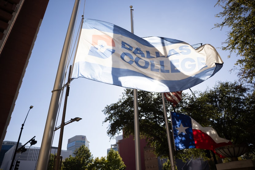 Flags fly outside of Dallas College’s El Centro Campus in downtown Dallas on Friday, Nov....