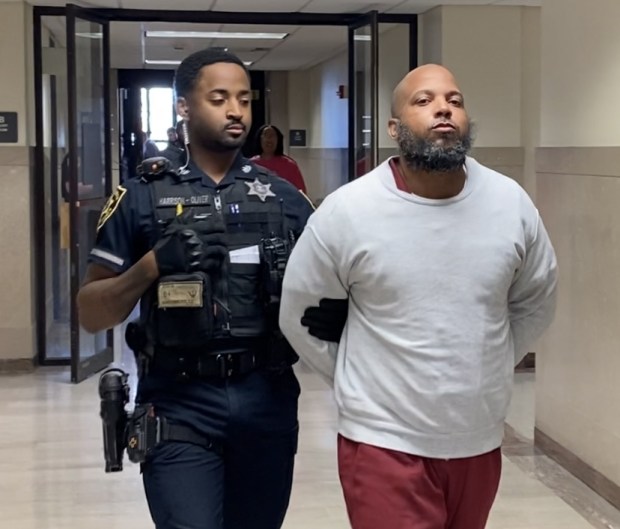 Gun trafficker Larry Williams is escorted by a deputy sheriff from a Montgomery County courtroom on April 17, 2025, to begin serving 22½ to 45 year prison term. (Photo by Carl Hessler Jr. - MediaNews Group)