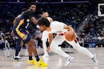 Portland Trail Blazers guard Shaedon Sharpe (17) drives to the basket past New Orleans Pelicans forward Herbert Jones (2) in the second half of an NBA basketball game, Wednesday, Nov. 12, 2025, in New Orleans.