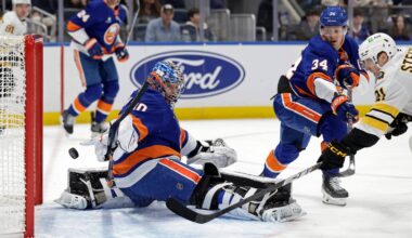 The Bruins' Alex Steeves gets the puck past Islanders goalie Ilya Sorokin to tie the score 1-1 in the second period.