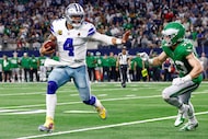 Dallas Cowboys quarterback Dak Prescott (4) runs the ball against Philadelphia Eagles...