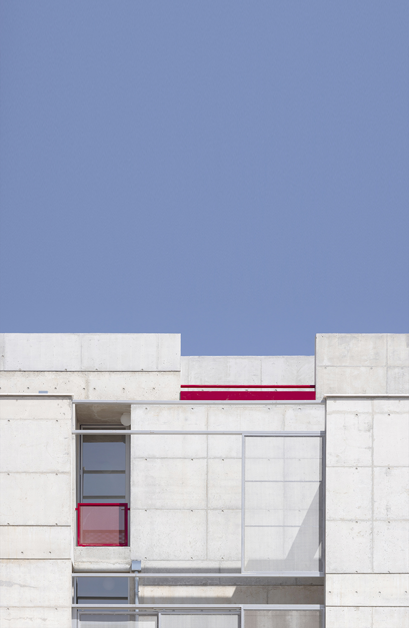 vertical cuts split monolithic 'cube within a cube' suburban residence in cyprus