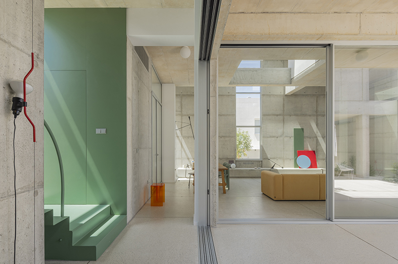 vertical cuts split monolithic 'cube within a cube' suburban residence in cyprus