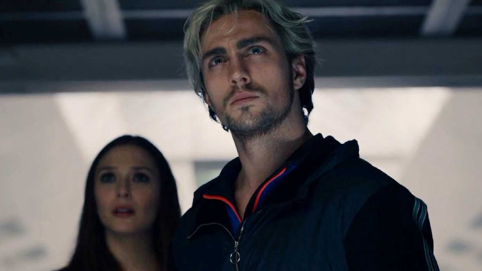 Aaron Taylor-Johnson's Pietro Maximoff aka Quicksilver looks puzzled next to Wanda in Avengers Age of Ultron