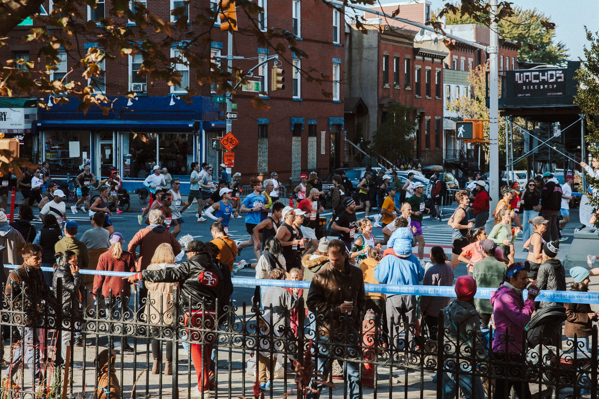 runners in a marathon on city streets runners in a marathon on city streets
