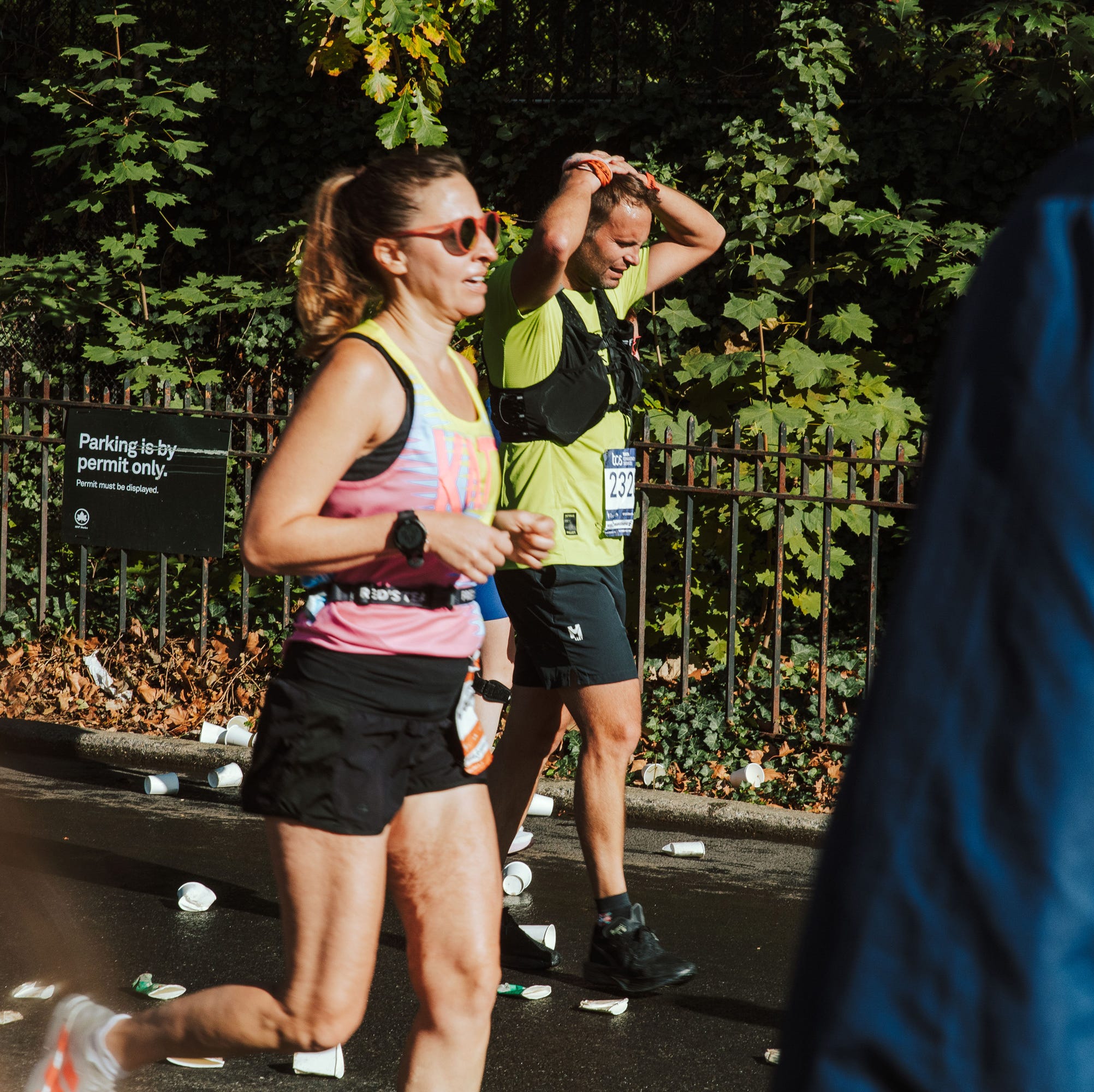 runners in a marathon on city streets runners in a marathon on city streets