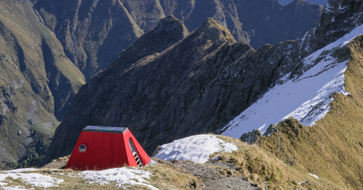 bergamo's modern art gallery embeds red bivouac shelter on the alps
