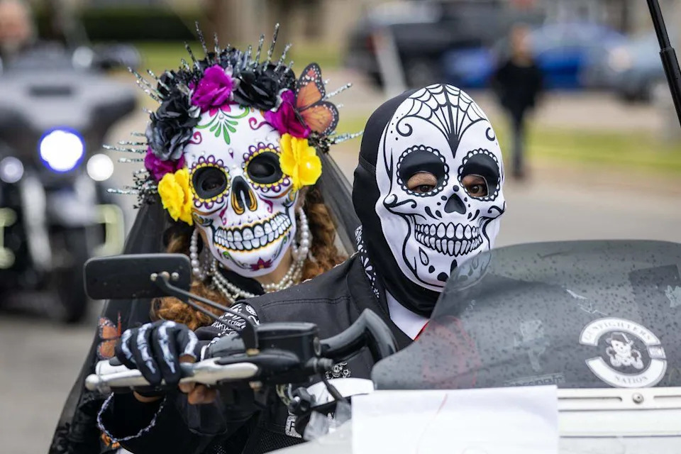 Parade participants ride down Ellis Avenue for the Día De Los Muertos Parade in Northside Fort Worth on Saturday, Nov. 1, 2025.