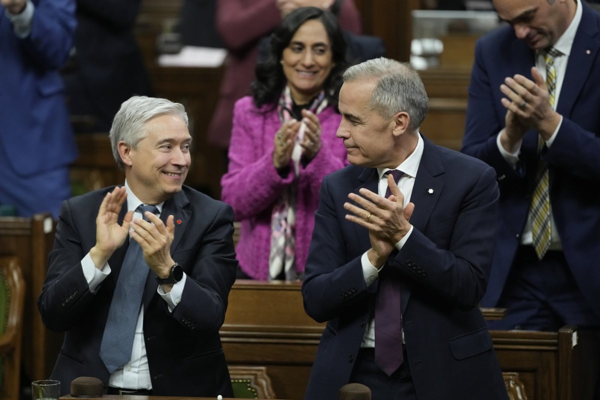 Liberal budget survives in tight House of Commons vote