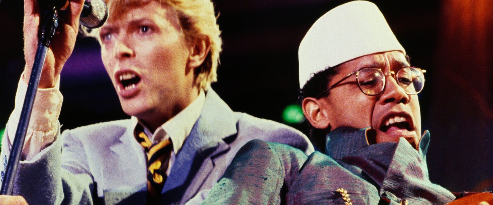 David Bowie and Carlos Alomar performing