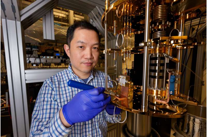 New research from University of Chicago Pritzker School of Molecular Engineering (UChicago PME) Asst. Prof. Tian Zhong could make it possible for quantum computers to connect at distances up to 2,000 kilometers (1,243 miles), shattering previous records and bringing a quantum internet closer than ever. Credit: UChicago Pritzker School of Molecular Engineering / Jason Smith Breakthrough could connect quantum computers at 200X the distance
