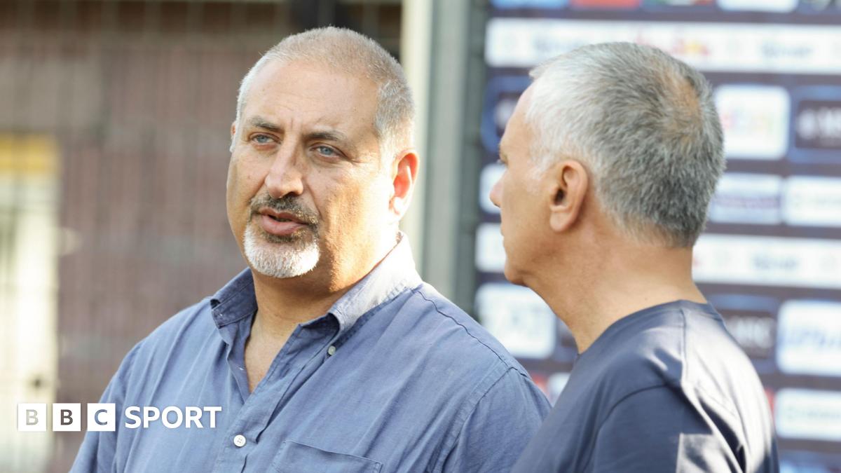 Napoli scouting manager Maurizio Micheli (left) talks to the Napoli's sport director Mauro Meluso