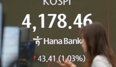 Asian shares trade lower after AI darlings prop up Wall Street