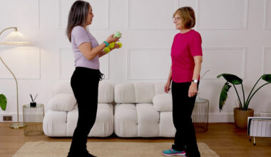 Hara Markos and Nicola Hirschle holding weights for compound exercises.