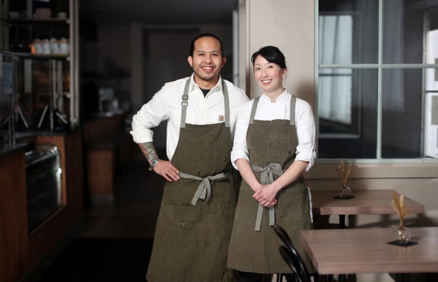 Kasama chef and owners Tim Flores and Genie Kwon at their restaurant in Chicago on Feb. 17, 2022. (John J. Kim/Chicago Tribune)
