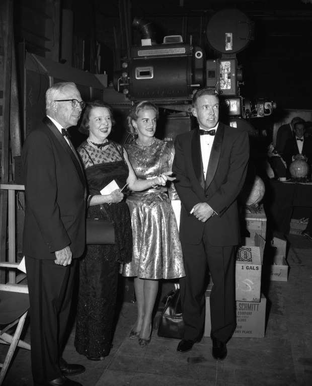 A pre-dinner tour of Wilding Studio at 1345 W Argyle St. is conducted by actress Colleen Moore Hargrave, second from left, at the final dinner for the Chicago International Film Festival on Nov. 13, 1965. With Moore are producer King Vidor, left, Alison Hunter Wrigley III and husband William "Bill" Wrigley III. Wilding Studio moved into the Essanay Building in Chicago, once owned by Essanay Film Manufacturing Company. (Al Phillips/Chicago Tribune) 