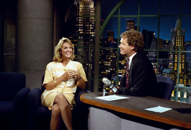 NBC "Today" anchor Deborah Norville visits David Letterman on "Late Night with David Letterman" on Sept. 5, 1990, in New York. (AP)