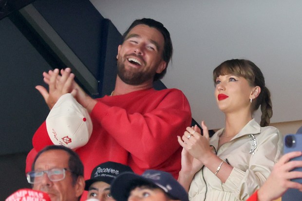 Travis Kelce and Taylor Swift watch the Edmonton Oilers and Florida Panthers play Game 4 of the Stanley Cup Final at Amerant Bank Arena on June 12, 2025, in Sunrise, Florida. (Bruce Bennett/Getty)