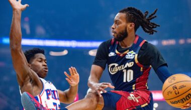 Cleveland Cavaliers' Darius Garland (10) looks to pass as Philadelphia 76ers' VJ Edgecombe, left, defends during the first half of an NBA basketball game in Cleveland, Wednesday, Nov. 5, 2025. (AP Photo/Phil Long)