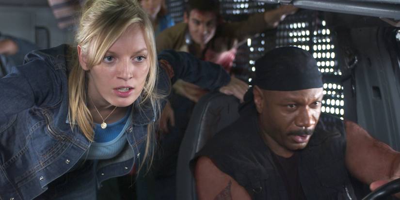 A group of survivors driving away in Dawn of the Dead 2004 movie