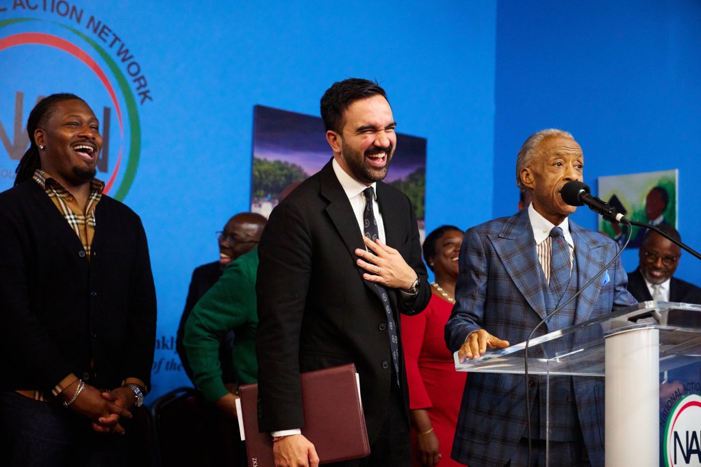 Democratic New York City mayoral nominee Zohran Mamdani and Rev. Al Sharpton speak at a National Action Network event.