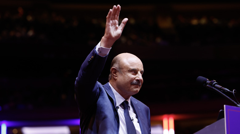Dr. Phil waving at a campaign event