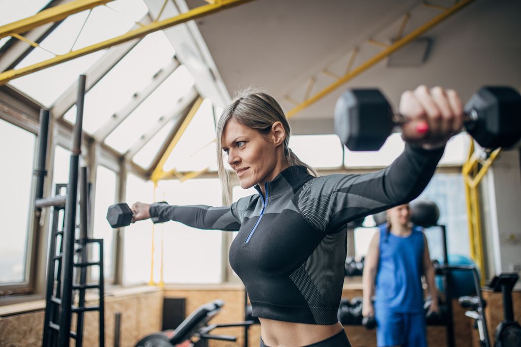  lateral arm raises with weights.j