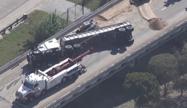 Truck flips over on North Loop at Eastex Freeway, leading to hours-long hazmat situation