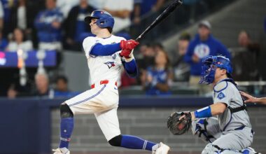 Toronto Blue Jays' Ernie Clement hits a double against the Los Angeles Dodgers during the eighth inning in Game 7 of baseball's World Series in Toronto on Saturday, Nov. 1, 2025. (Nathan Denette/The Canadian Press via AP)
