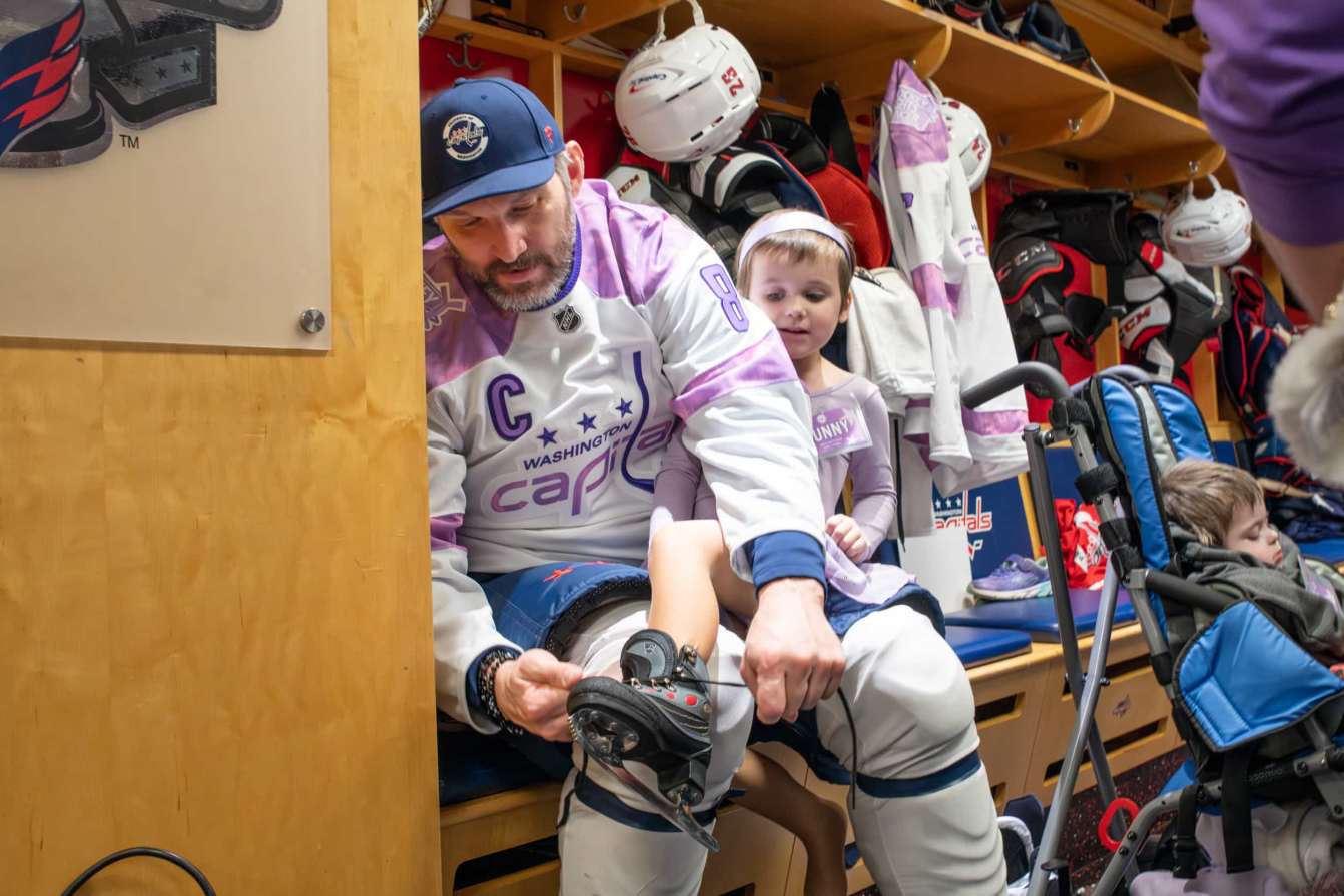 Alex Ovechkin and Sunny in the locker room before the Hockey Fights Cancer skate.