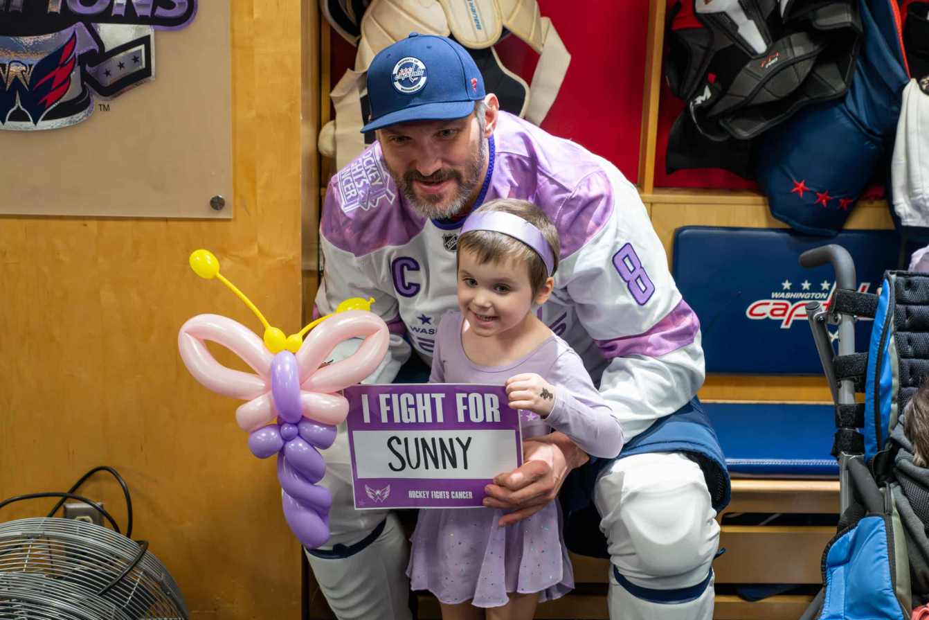 Alex Ovechkin and Sunny in the locker room before the Hockey Fights Cancer skate.